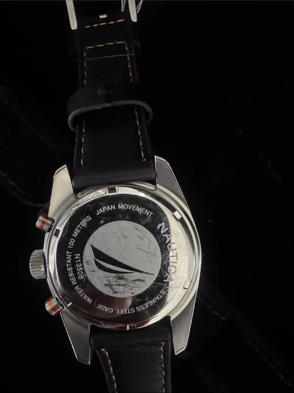 Nautica White Dial Chronograph Watch with Black Bezel and Orange Accents